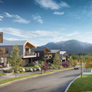 Rendering of a neighbourhood street view featuring dark and light modern homes and mountains in the background.